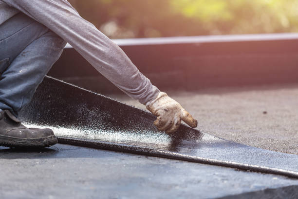 Professional Basement Waterproofing technician working in Falkville, AL